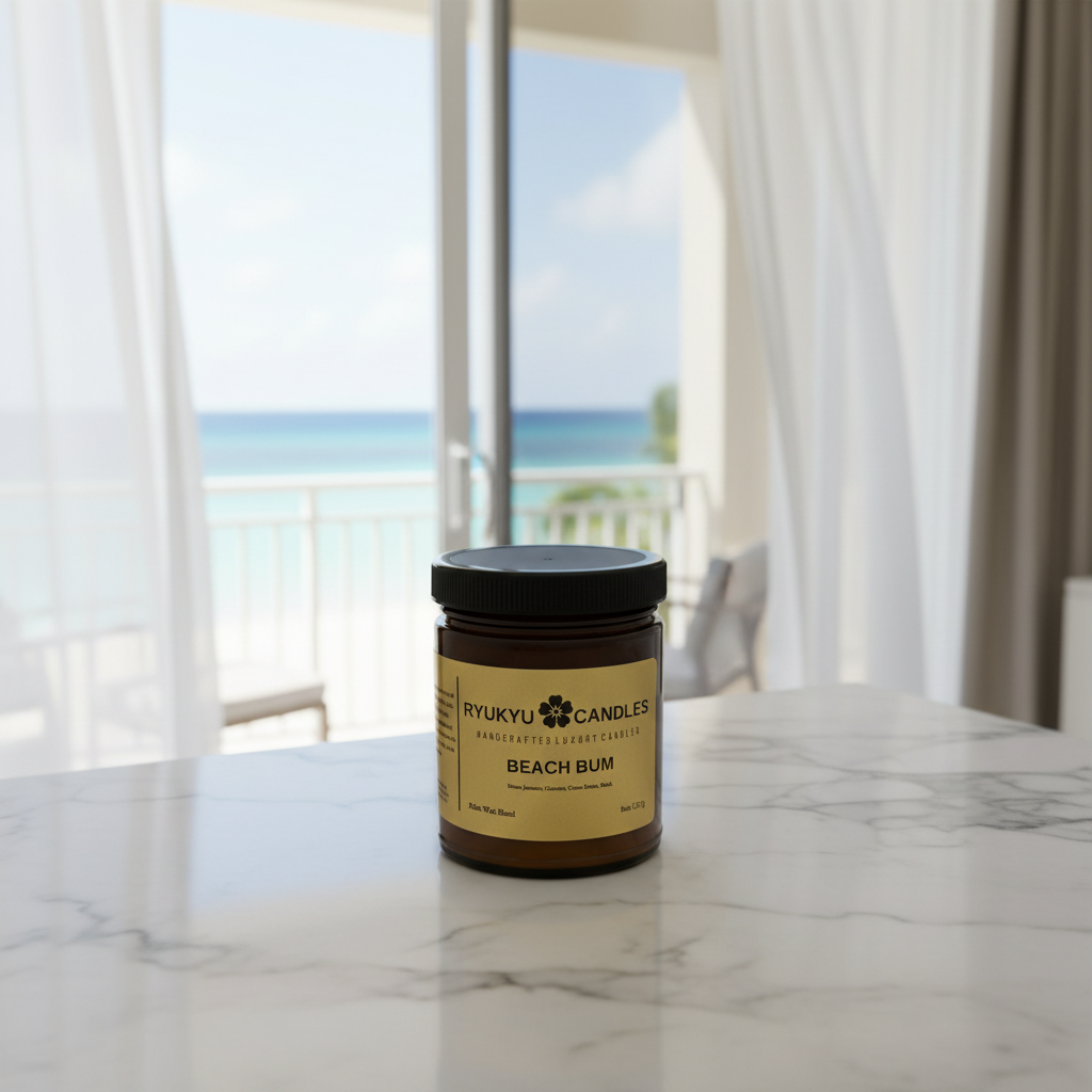 Beach Bum luxury scented candle in a amber glass jar with gold labels