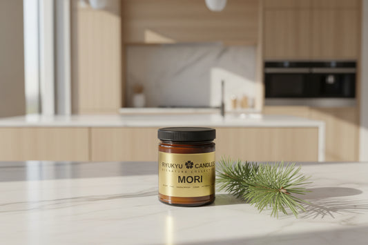 Jar of 'Mori' candle on a kitchen counter with a modern kitchen background